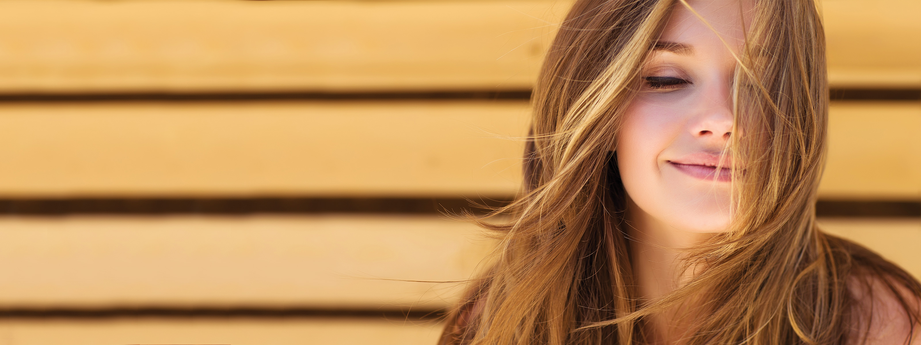 woman softly smiling