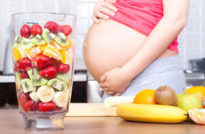 pregnant woman eating healthy.
