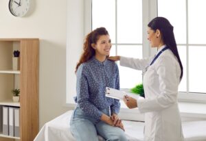 Woman at her first obstetric appointment.