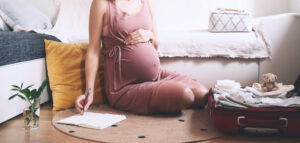 pregnant woman packing for hospital.