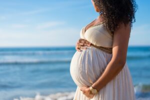 pregnant woman on the beach
